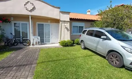 Casa em condomínio fechado com 3 quartos à venda na Central, 1001, Noiva Do Mar, Xangri-Lá por R$ 920.000