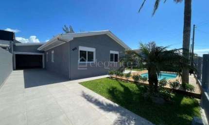 Casa com 4 quartos à venda na Das Sereias, 302, Centro, Xangri-Lá por R$ 710.000