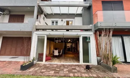 Casa em condomínio fechado com 3 quartos à venda na Rua Irerê, 561, Atlântida, Xangri-Lá por R$ 600.000