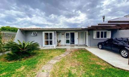 Casa com 3 quartos à venda na Rio Das Contas, 859, Centro, Xangri-Lá por R$ 649.990