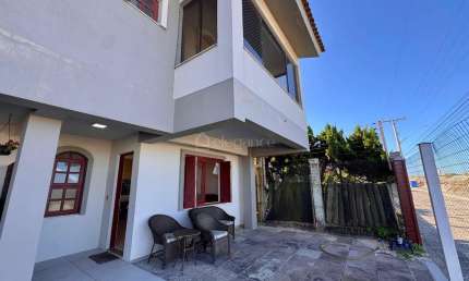 Casa em condomínio fechado com 2 quartos à venda na Beira Mar, 41, Centro, Xangri-Lá por R$ 550.000