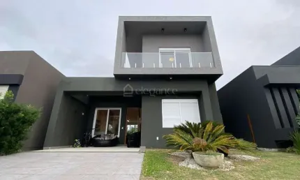 Casa em condomínio fechado com 4 quartos à venda na Rua Rio Camisas, 231, Centro, Xangri-Lá por R$ 1.550.000