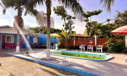 Casa em condomínio fechado com 3 quartos à venda na Rua Das Hortências, 107, Noiva Do Mar, Xangri-Lá por R$ 585.000