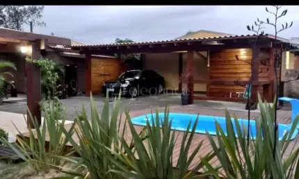 Casa com 3 quartos à venda na Dos Lírios, 502, Noiva Do Mar, Xangri-Lá por R$ 950.000