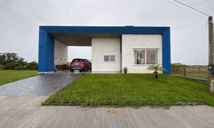 Casa em condomínio fechado com 3 quartos à venda na Rs 389, Estrada do Mar, 27, Santorini, Xangri-Lá por R$ 850.000