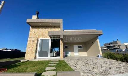 Casa em condomínio fechado com 3 quartos à venda na Rs 389, Estrada do Mar, 27, Santorini, Xangri-Lá por R$ 1.350.000