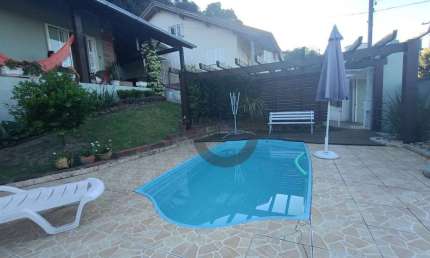 Casa com 2 dormitórios(suíte) e piscina à venda, 164 m² por R$ 605.000 - Renascença - Santa Cruz do Sul/RS