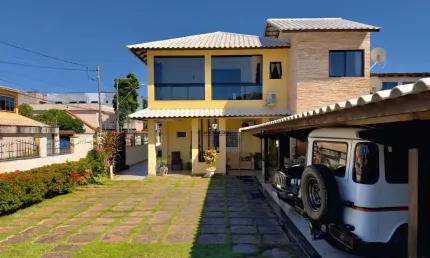 Imóvel de luxo em Guarapari-ES: Casa à venda em Itapebussu com 4 quartos, 2 suítes e amplo espaço!
