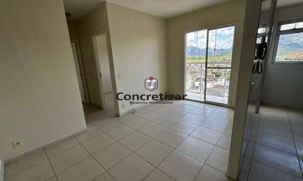 Apartamento à venda na Praia do Morro, Guarapari-ES: 2 quartos, 1 suíte, 1 sala, 2 banheiros, 1 vaga, 65,00 m².