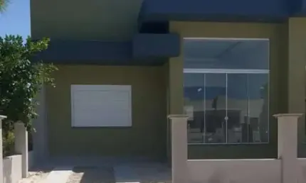 Casa Nova à Venda no Centro de Imbé – Modernidade e Qualidade em excelente localização!