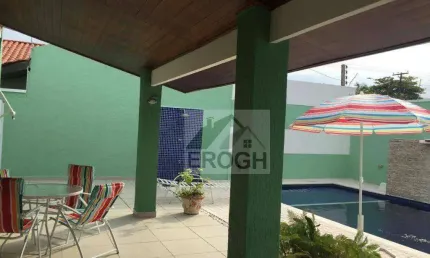 Casa com 3 dormitórios à venda, 180 m² por R$ 1.170.000 - Balneário Praia do Pernambuco - Guarujá/SP