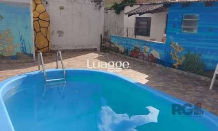 Casa com 4 quartos à venda na Rua Júlio Dias de Souza, 500, Aberta dos Morros, Porto Alegre