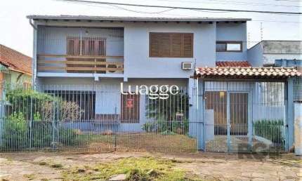 Casa com 3 quartos à venda na Rua Vítor Valpírio, 489, Anchieta, Porto Alegre