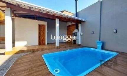 Excelente casa de 85m² com 2 dormitórios, piscina e 6 vagas.