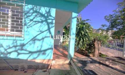 Casa com 4 quartos à venda na Rua Sebastião Wolf, 314, Nonoai, Porto Alegre