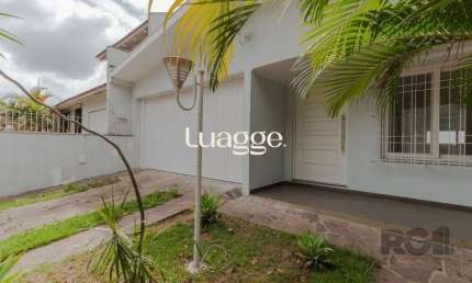 Casa 03 quartos, 02 vagas,próxima à Assis Brasil e Sertório.