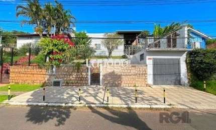 Casa Condominio em Porto Alegre, no bairro Santa Tereza, com 3 dormitório(s), e 3 banheiros, à venda.
