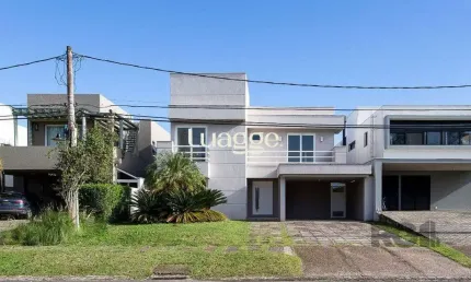 Casa em condomínio fechado com 4 quartos à venda na Avenida Juca Batista, 9087, Belém Novo, Porto Alegre