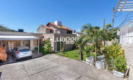 Casa para Venda - 370m², 4 dormitórios, sendo 1 suites, 6 vagas - Lomba do Pinheiro