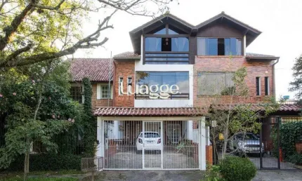 Casa com 3 quartos à venda na Rua Ponciano Pacheco da Silveira, 174, Guarujá, Porto Alegre