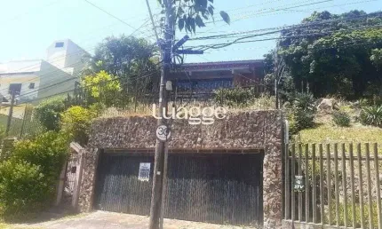 Casa com 5 quartos à venda na Rua Alcebíades Antônio dos Santos, 359, Nonoai, Porto Alegre