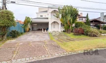 Casa em condomínio fechado com 3 quartos à venda na Avenida Juca Batista, 9067, Belém Novo, Porto Alegre