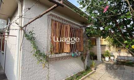 Casa com 3 quartos à venda na Rua Dona Firmina, 806, Vila São José, Porto Alegre