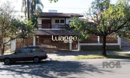 Casa com 4 quartos à venda na Rua Upamaroti, 794, Cristal, Porto Alegre