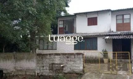 Casa com 5 quartos à venda na Rua Victor Silva, 634, Camaquã, Porto Alegre