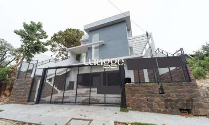 Casa com 3 quartos à venda na Rua Professor Emílio Meyer, 205, Vila Conceição, Porto Alegre