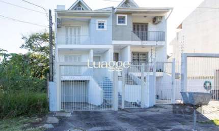 Casa com 3 quartos à venda na Rua Claudio da Silva Pinto, 608, Espírito Santo, Porto Alegre