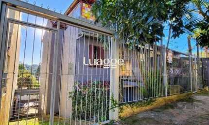 Casa com 4 quartos à venda na Rua Oscar Tollens, 63, Santa Tereza, Porto Alegre