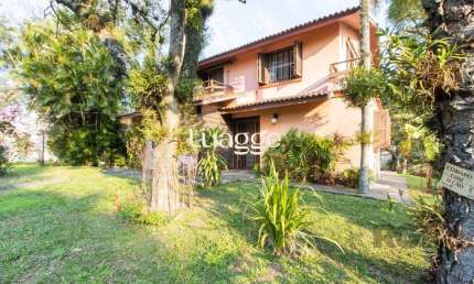 Casa com 4 quartos à venda na Rua Itapitocaí, 794, Cristal, Porto Alegre