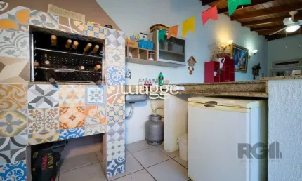 Casa em condomínio fechado com 3 quartos à venda na Avenida Eduardo Prado, 2101, Cavalhada, Porto Alegre