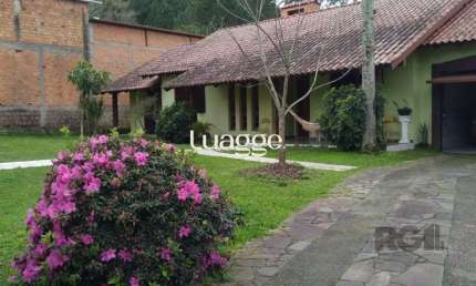 Casa com 4 quartos à venda na Avenida João Antônio Silveira, 8823, Restinga, Porto Alegre