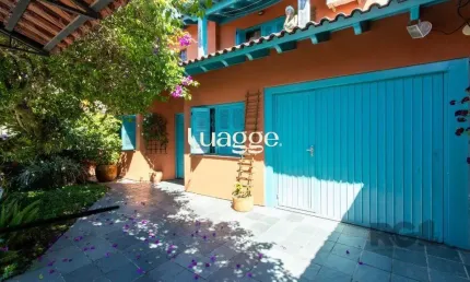 Casa com 3 quartos à venda na Rua Breno Rosa, 70, Vila Nova, Porto Alegre