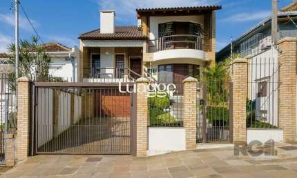 Casa com 4 quartos à venda na Rua Campos Elíseos, 288, Glória, Porto Alegre