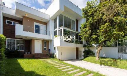 Casa com 3 quartos à venda na Avenida Fábio Araújo Santos, 1295, Nonoai, Porto Alegre