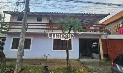 Casa com 3 quartos à venda na Rua Hesiodo Andrade, 336, Hípica, Porto Alegre