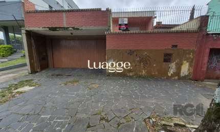 Casa com 4 quartos à venda na Rua Dário Totta, 472, Teresópolis, Porto Alegre