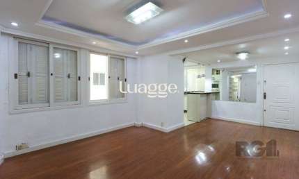 Apartamento semi-mobiliado, possui 3 dormitórios, sendo 1 suíte