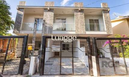 Casa com 3 quartos à venda na Rua Abdo Jorge Curi, 235, Parque Santa Fé, Porto Alegre