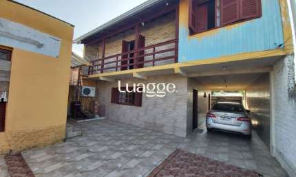 Casa com 3 quartos à venda na Rua Império, 130, Vila Nova, Porto Alegre