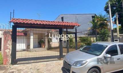 Casa com 3 quartos à venda na Rua Afonso Arinos, 590, Camaquã, Porto Alegre