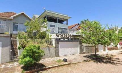 Casa com 167m², 4 dormitórios, 2 suítes, 2 vagas no bairro Santa Tereza