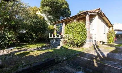 Casa de alvenaria com 104,37m² 3 dormitórios sendo 1 suíte, 2 vagas cobertas