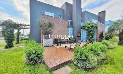 Excelente Sobrado de esquina, com vista para o lago, próximo ao clube social, no Condomínio Acqualina Beach, localizado na praia de Maristela , em Xangri-La,. Possui 4 dormitórios, sendo 3 suítes,