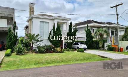 Casa em condomínio fechado com 4 quartos à venda na Avenida Central, 2578, Atlântida, Xangri-Lá