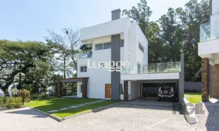Casa em condomínio fechado com 3 quartos para alugar na Avenida Coronel Marcos, 1314, Pedra Redonda, Porto Alegre
