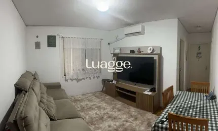 Apartamento de 2 dormitórios, living, cozinha, área de serviço e banheiro social.